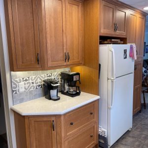 coffee bar by refrigerator