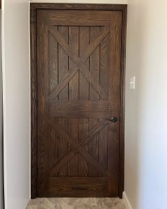 door installation brown wooden barn style door