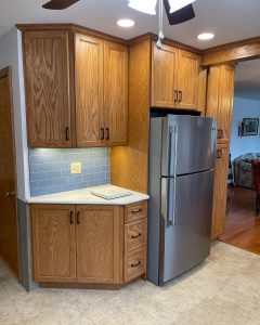 kitchen fridge with corner cabinet